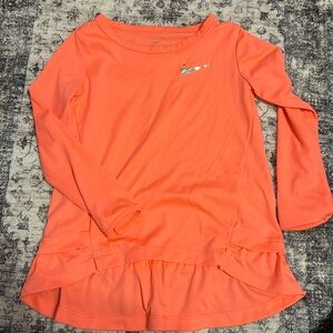 Fluorescent pink Nike peplum top